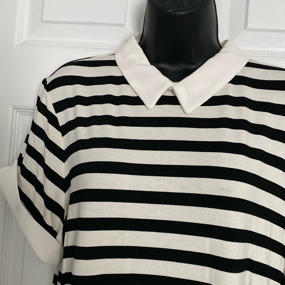 Black and white striped short sleeve top with collar